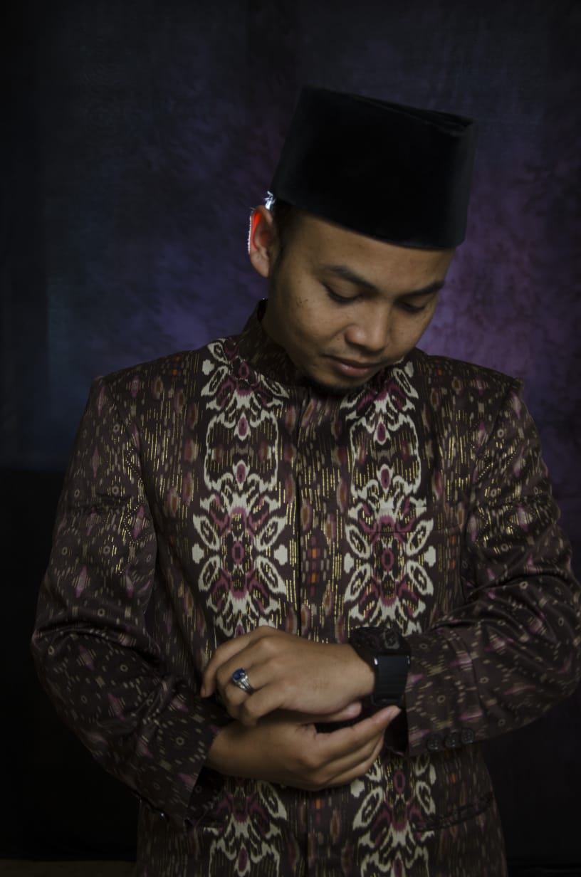 Muhammad Ishom Fuad. S.M.